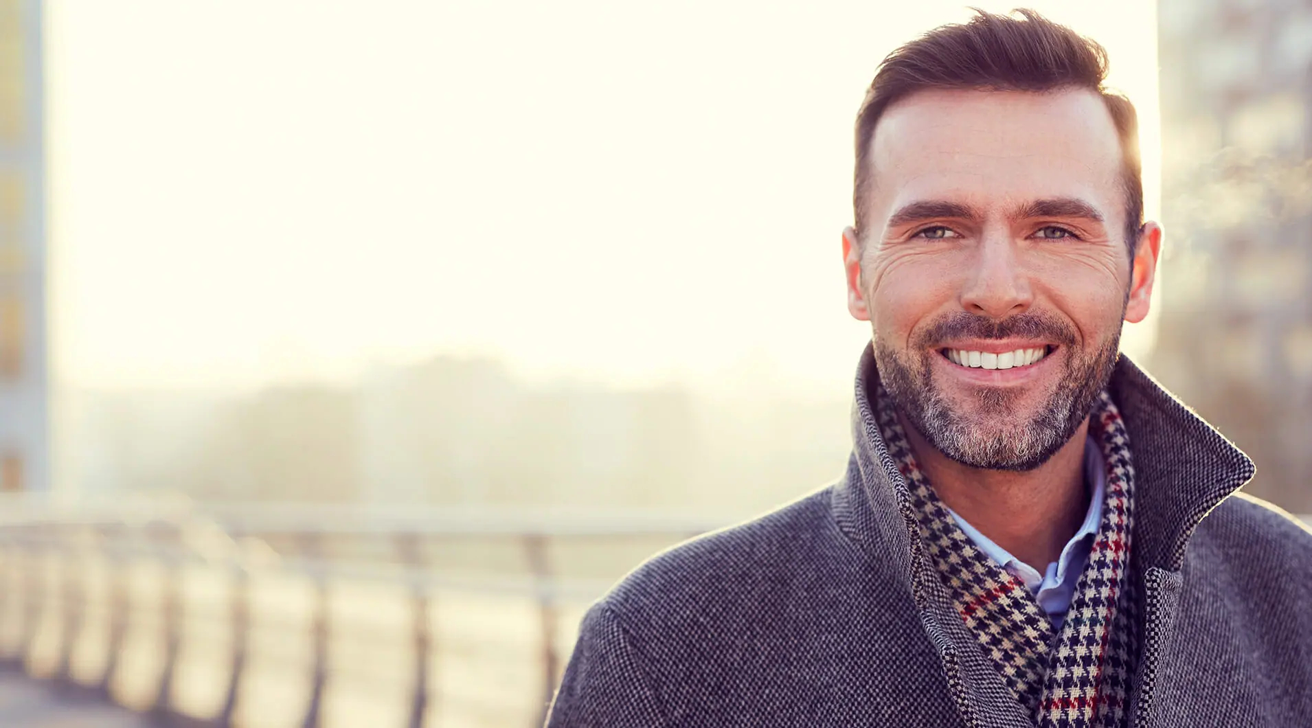 Middle Aged Man in Jacket Outside Smiling | Botox for Men - Bakersfield CA
