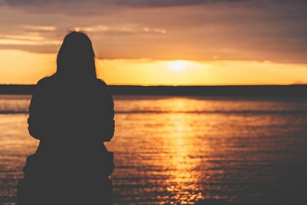 Woman Watching Sunset | Synergy Recovery Services | Addiction Revocery Treatment | Bakersfield CA