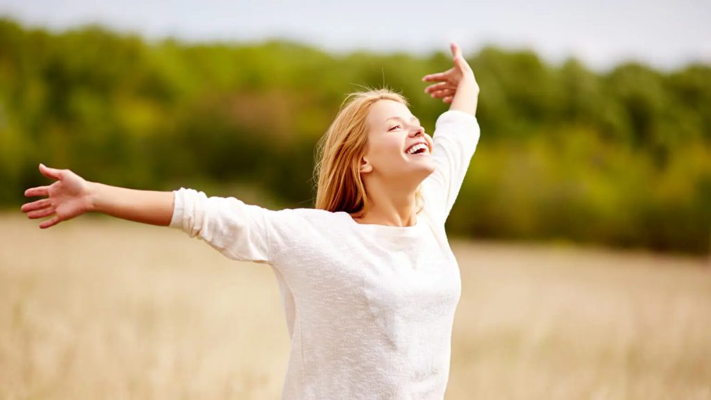 Smiling Woman in Field