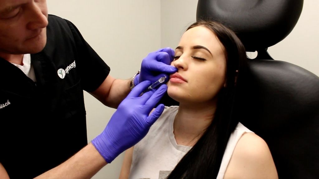 Dr. Trobisch Performing Lip Injections On Patient | Synergy Wellness Center | Lip Fillers | Bakersfield CA